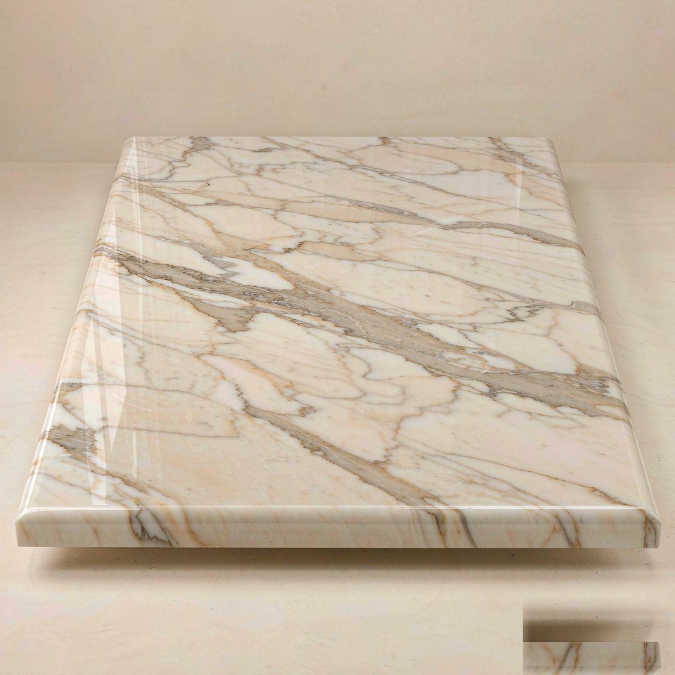 象牙白 Ivory White Marble 石材樣板圖,米白系,產地西班牙,產地西班牙,體積密度2.74 g/cm³,吸水率≤0.41%,莫氏硬度4,適用於牆身、檯面、洗手間、大堂、客廳