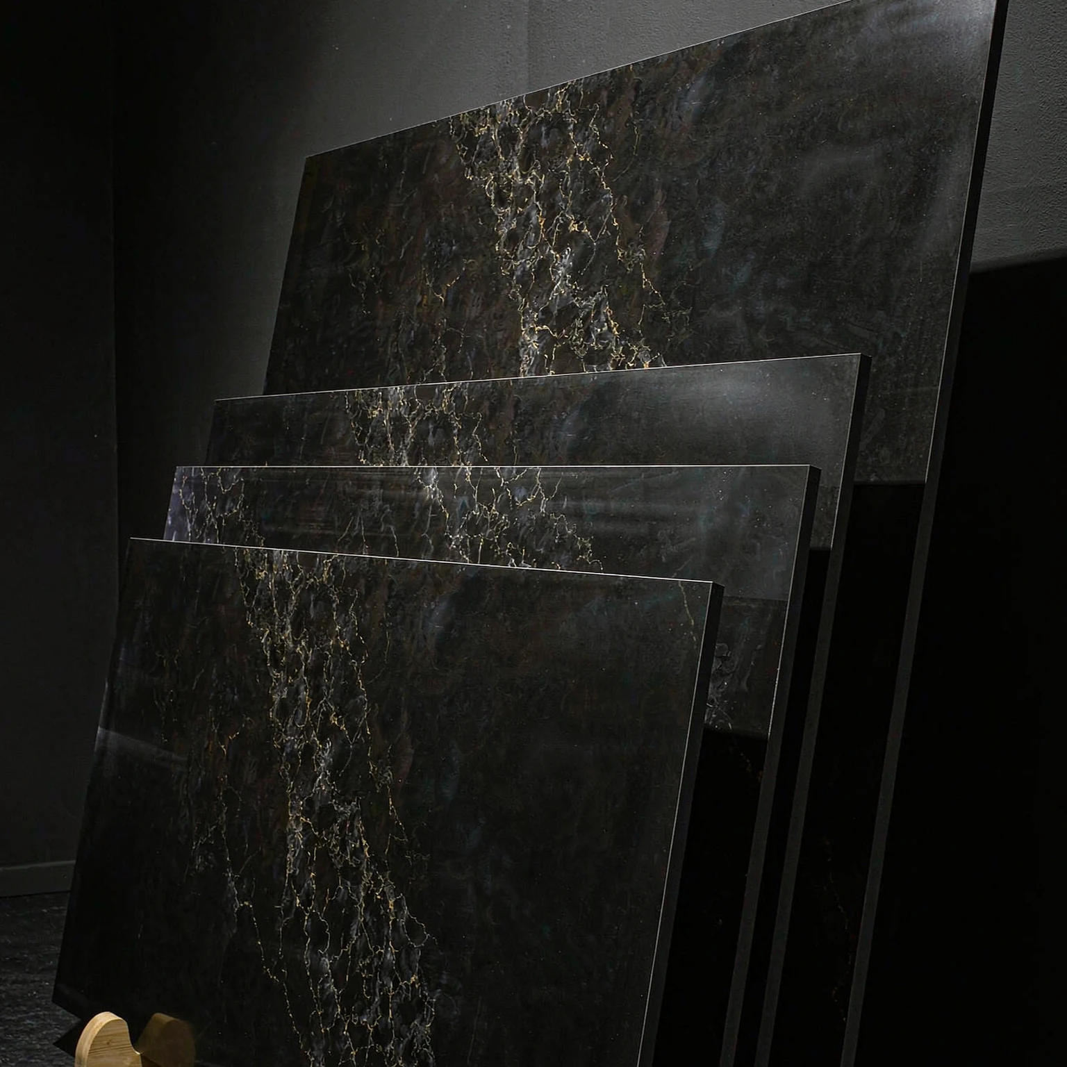 Laurent Black Gold · four slab views